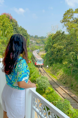 A woman watching the train approaching